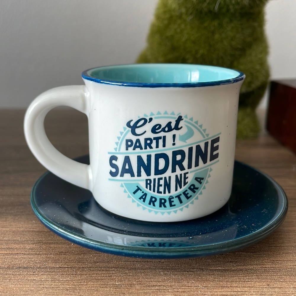 LAST DAY DEC. 10 
MOVING. SANDRINE NOTHING WILL STOP HER. COFFEE CUP. NEW